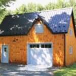 garage polebarn with wooden board and batten pine siding