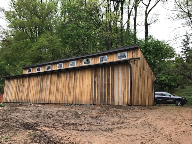 custom built storage building with wood siding
